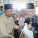 Bupati Tanjab Barat Serahkan 297 Paket Sembako di Kampung Nelayan dalam Rangka HUT RI ke-80 dan Hari Jadi ke-60 Kabupaten